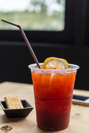 iced tea and lemon put on wood boxの写真素材