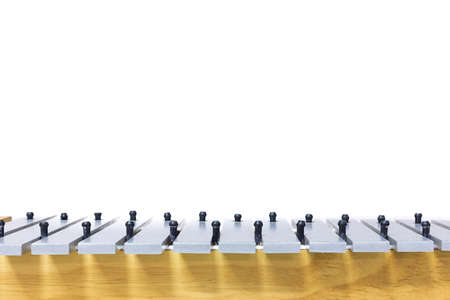The metallophone and mallet on the white backgroundの写真素材