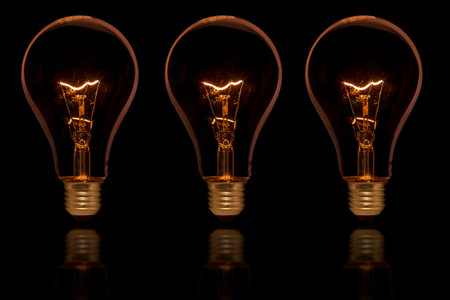 The old style Incandescent bulbs on black background