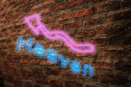 Neon word heaven on the old vintage brick wallの写真素材
