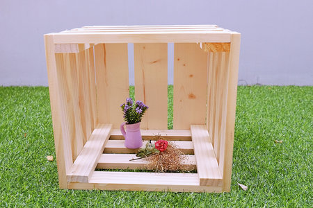 Wooden Box with Purple Little Flower in Potの写真素材