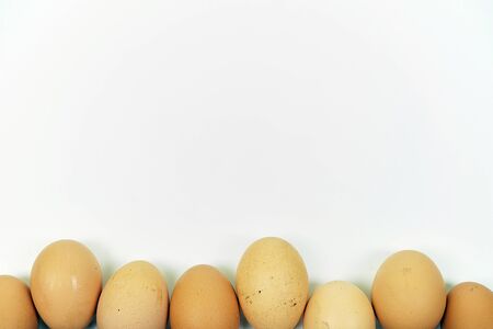 Fresh eggs on white background with copyspace. Easter photo conceptの写真素材