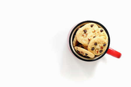 Top view cookies in cup on white backgroundの写真素材