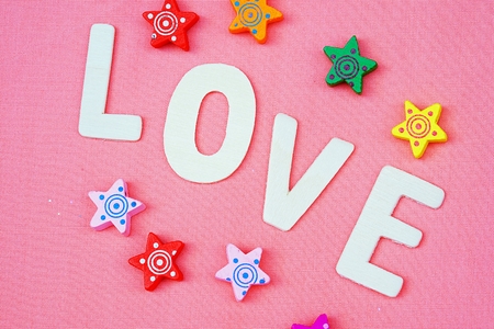 small star with love word on pink background, Valentines day conceptの写真素材