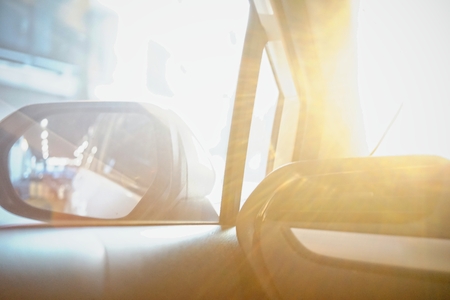 selective focus, car air conditioning, car interior and sun raysの写真素材