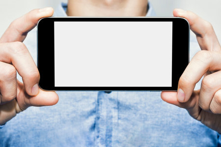 Phones, Something That Everyone Uses Every Day, For Communication, Close-up of a Man's Hand Holding...