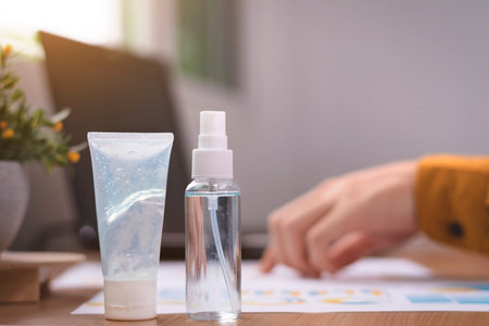 Businessmen work on their desks at home and prevent coronavirus or Corona Virus Disease (Covid-19)...