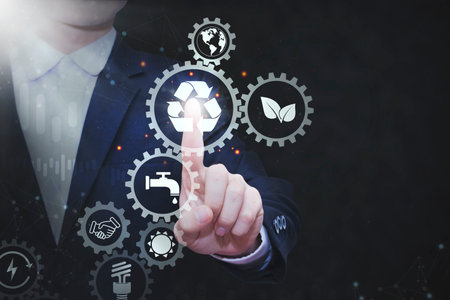 Business people press the button recycle on the virtual touch screen recycle concept and Concept of electric power saving campaignの写真素材