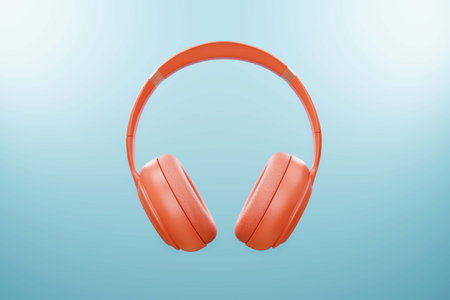 Modern Orange color headphone, Listen to music On a fresh blue background put relax. during summer...