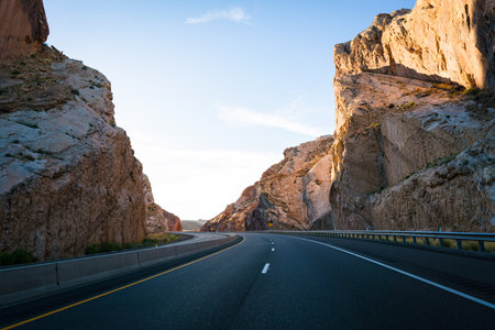 Driving through the mountain range on a highway