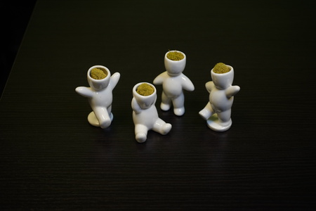 little ceramic toy with plantsの写真素材