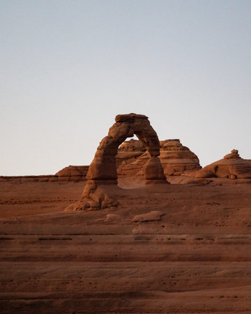 delicate arch in dessert landscape in utah