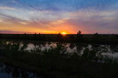 beautiful and colorful sunset at large lake in floridaの写真素材