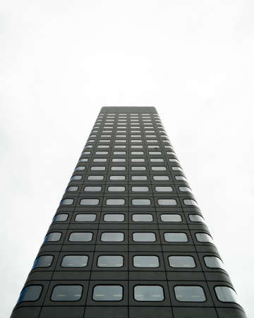 symmetrical building with white background during cloudy dayの写真素材