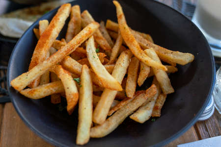 side plate of thick cut yellow crispy french friesの写真素材