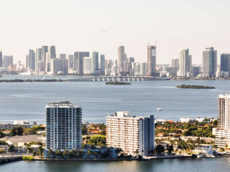 downtown miami in the background of island with buildings from a droneの写真素材