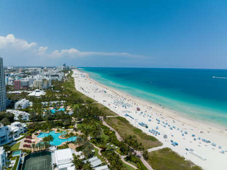 wide shot of miami beach during the bright summer day from a drone aerialの写真素材