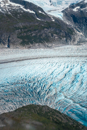 amazing shot of blue crevasses taken from a helicopterの写真素材