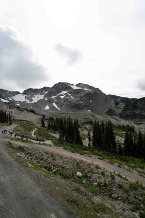 wide angle capture of mountain landscape with mountains topped with snow during the fall in canadaの写真素材