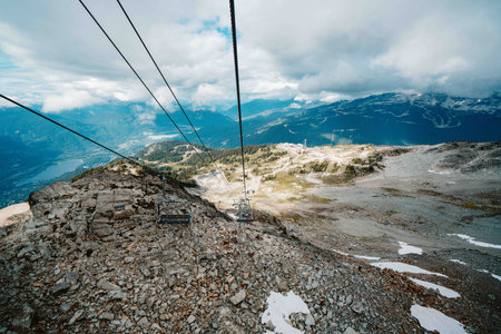 epic view from top of mountain resort showing chair liftの写真素材