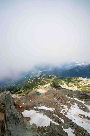 vertical capture of epic landscape view on top of mountain resort during the dayの写真素材