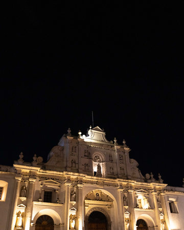 night time capture of antique old facade of spanish colonial building in south americaの写真素材