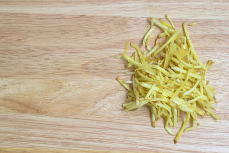 Ginger on wooden cutting boardの写真素材