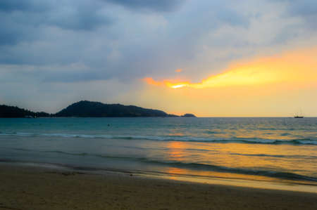 sunset on the beach,Phuket in Thailandの写真素材