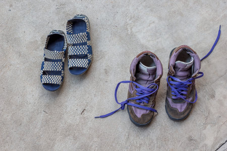 shoes walking on gravel roadの写真素材