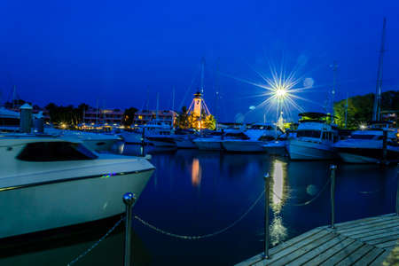 Many luxury yachts at the harbour,night time in Phuket boat lagoon, Thailandの写真素材