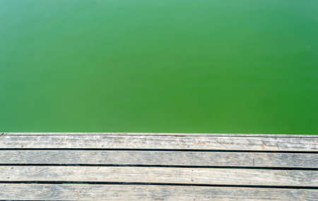 wood floor and water in poolの写真素材