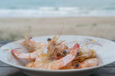 fresh seafood shrimp on wooden tableの写真素材