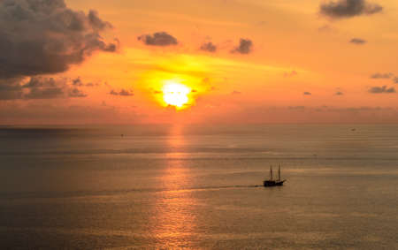 Beautiful sunset seen from Promthep cape in Phuket Thailandの写真素材