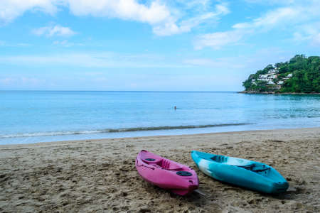Canoe moored on the Kamala beach in Phuket Thailand.の写真素材