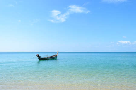 longtail boat or fishing boat at Naiyang beach,Phuket in Thailandの写真素材