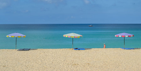 Colorful beach umbrella against the bright sky at Surin Beach in Phuket ,Thailand