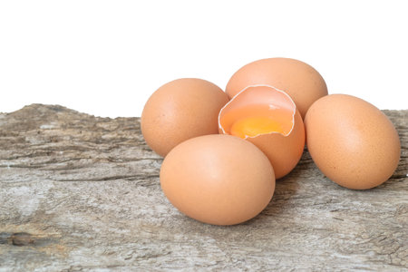 Eggs on wooden table background