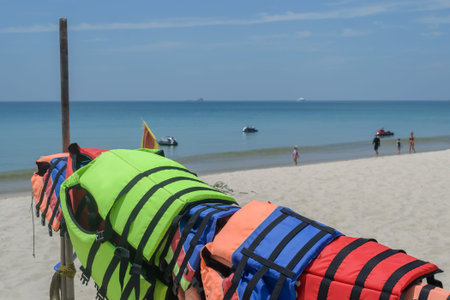 Colorful life jackets on beach in Phuket Thailand