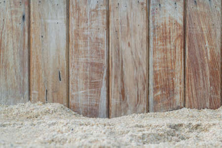 Sand and planked wood background with copy spaceの写真素材