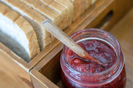 breakfast with strawberry jam and Bread,selective focusの写真素材