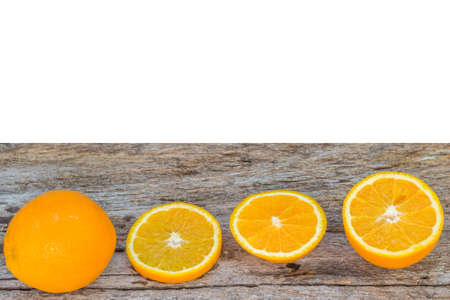 fresh slice orange on the old wood backgroundの写真素材
