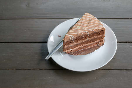 fresh cake black chocolate with cream orangeの写真素材