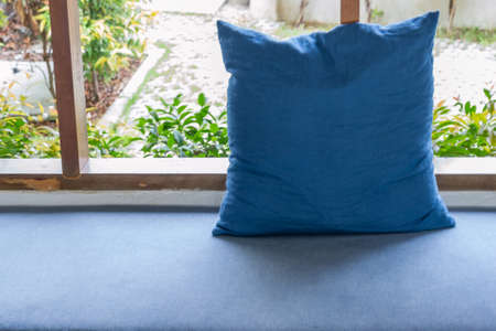 Blue pillow on the sofaの写真素材