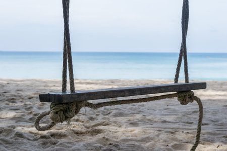Swings on the Beach in Phuket Thailandの写真素材