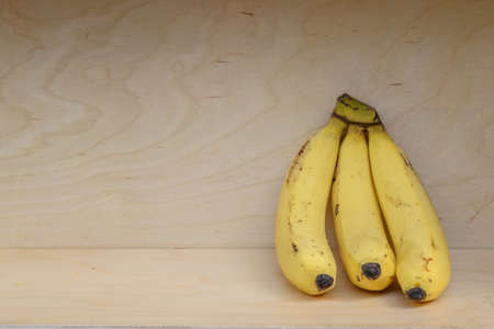 Bananas on the wood background for Healthy concept.の写真素材