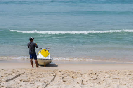 jet ski on sandy beach in Phuket, Thailandの写真素材
