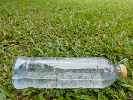 water bottle on grassの写真素材