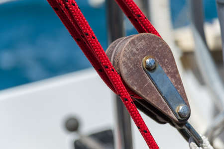 Sailing block with rope of sailboatの写真素材