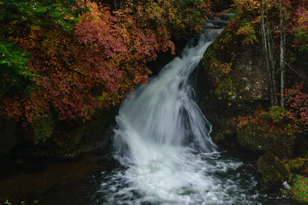 Ryuzu waterfall with autumn in Nikko Japanの写真素材