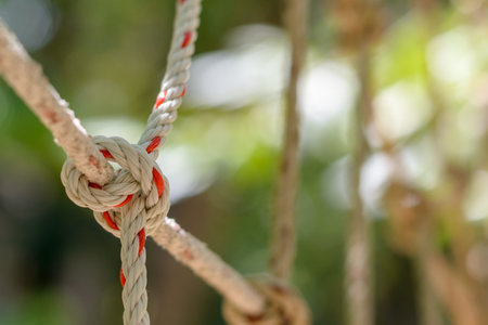 Close up of the rope ladder at playground in Thailand.